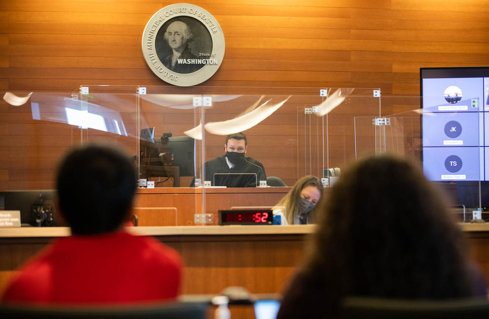 a judge presides over a courtroom in seattle