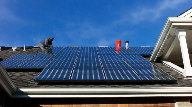 Rooftop solar is a booming industry. But some consumer watchdogs worry there are too few protections against bad actors.    