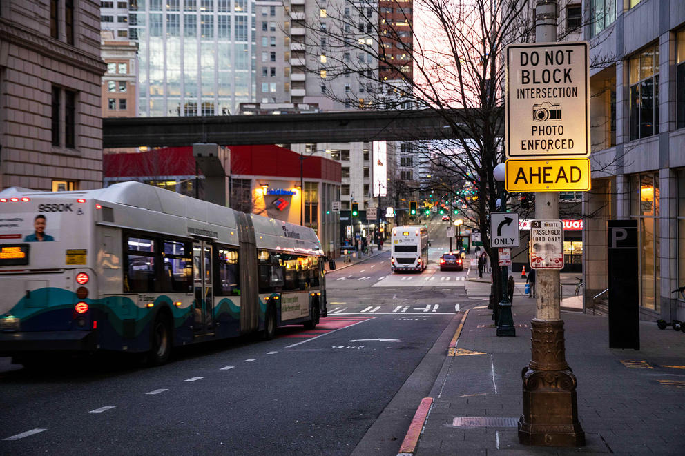 A sign in downtown Seattle reads "Photo enforced"