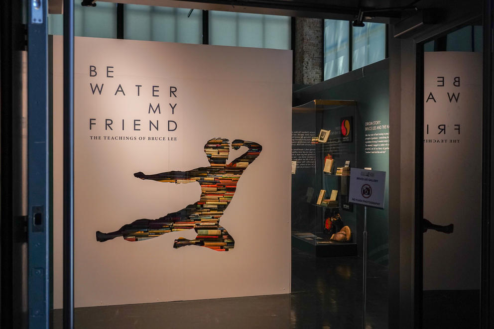 photo of the entrance to a museum exhibit with the image of a leaping man