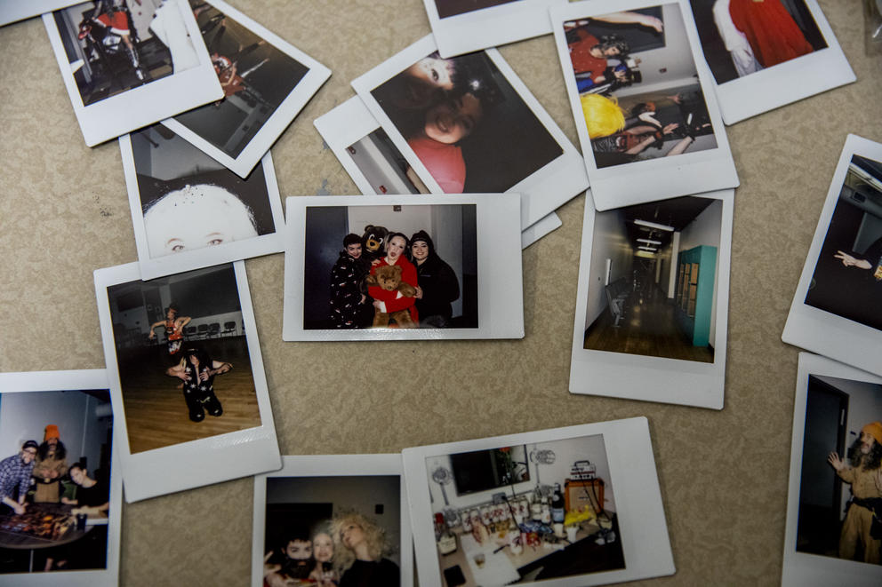 Polaroids spread out on a table