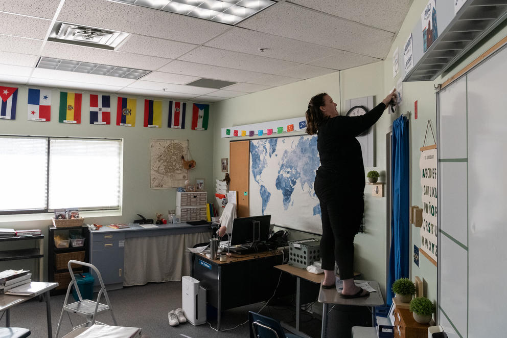 Caitlin Tumlinson posts Spanish language laminates around her classroom
