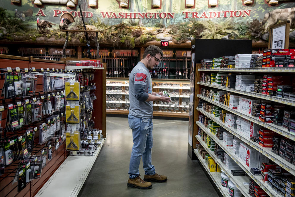 John Abbitt shops for ammunition on his way to a Pink Pistols meetup on May 18, 2019. (Photo by Dorothy Edwards/Crosscut)