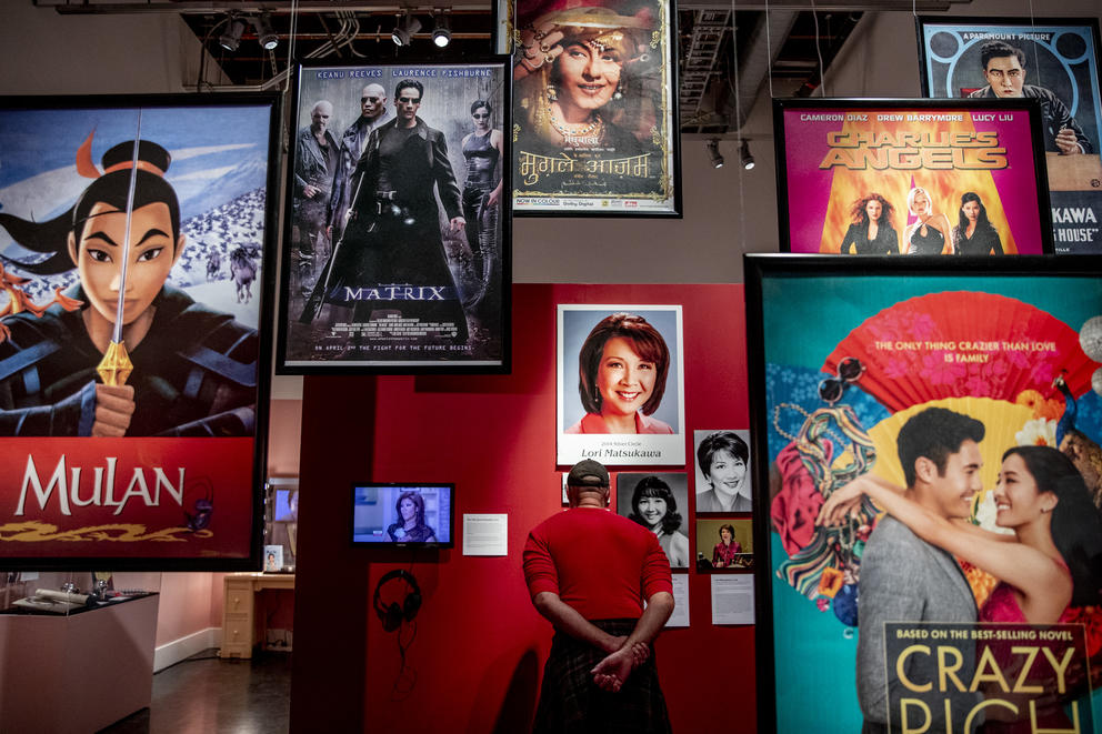 Movie posters hang from the ceiling 