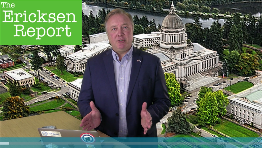 State Sen, Doug Ericksen stands in front of a background of the Legislative Building, with the words "Ericksen report" in the corner of the screen