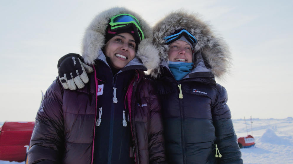 photo of two women in heavy snow gear