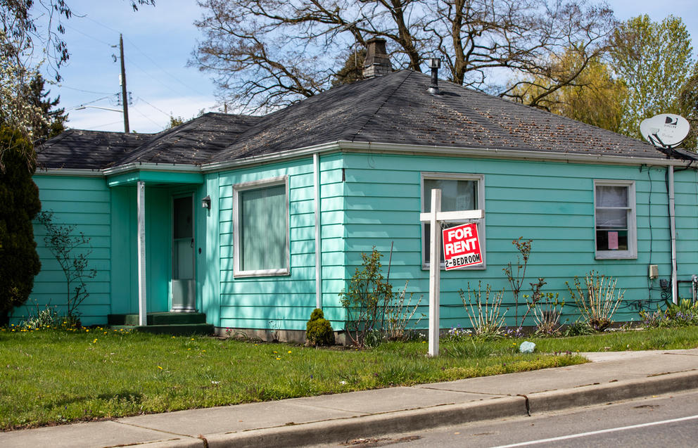 A teal-colored home for rent in Bryn Mawr-Skyway neighborhood.