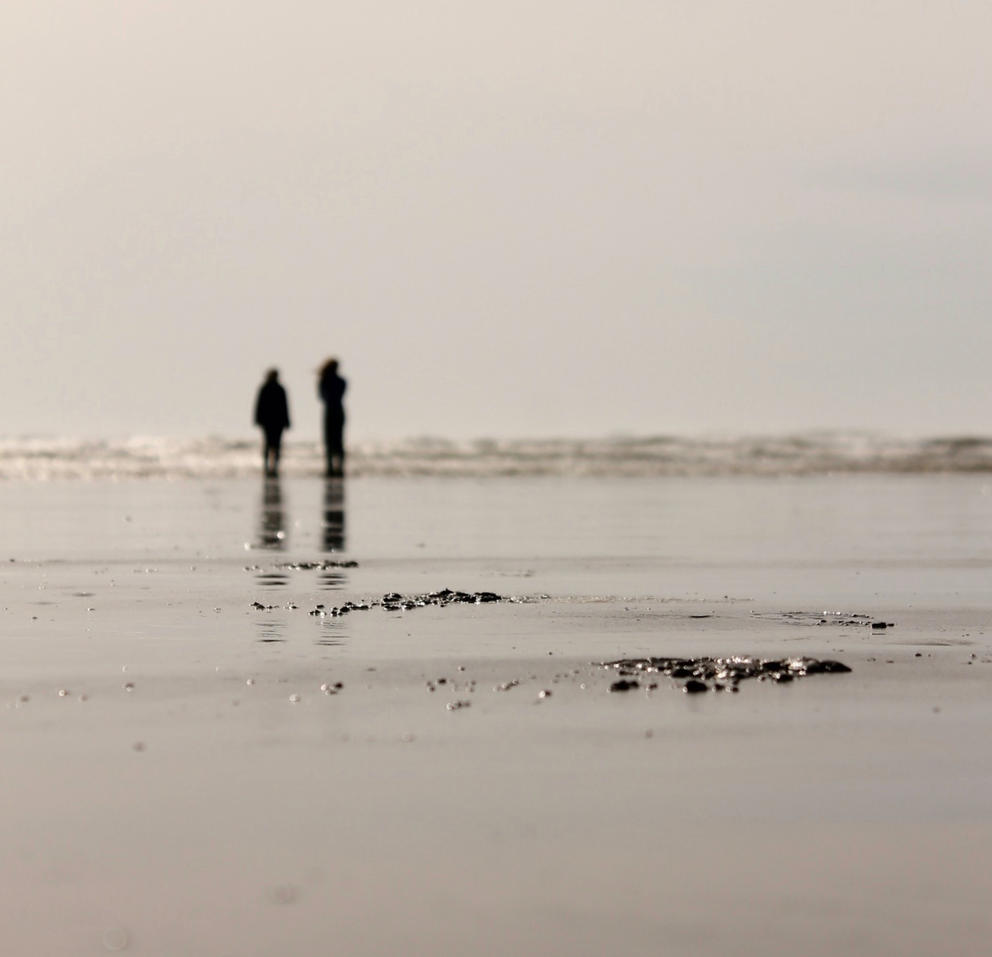 two people on a beach