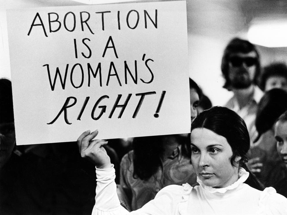 Abortion protest in the 1970s. One sign reads "Abortion is a woman's right!"