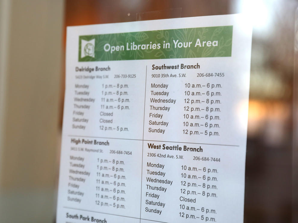 a flyer showing library hours