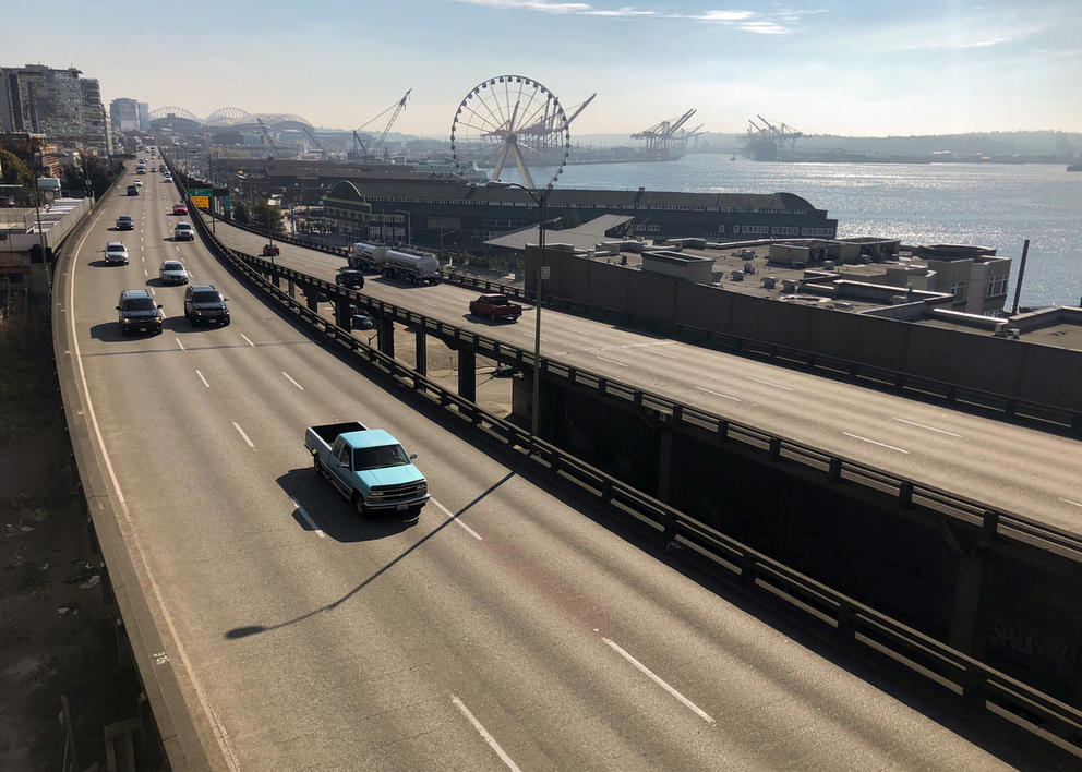 waterfront of Seattle with two viaducts with cars on 