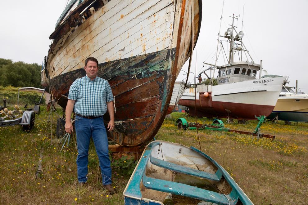 Abandoned boats await recycling in a yard at the Port of Ilwaco. Port Manager Guy Glenn hopes to construct a recycling center there to handle Southwest Washington’s derelicts. DNR is helping to fund the project with a nearly $1 million grant as part of a rural communities program.