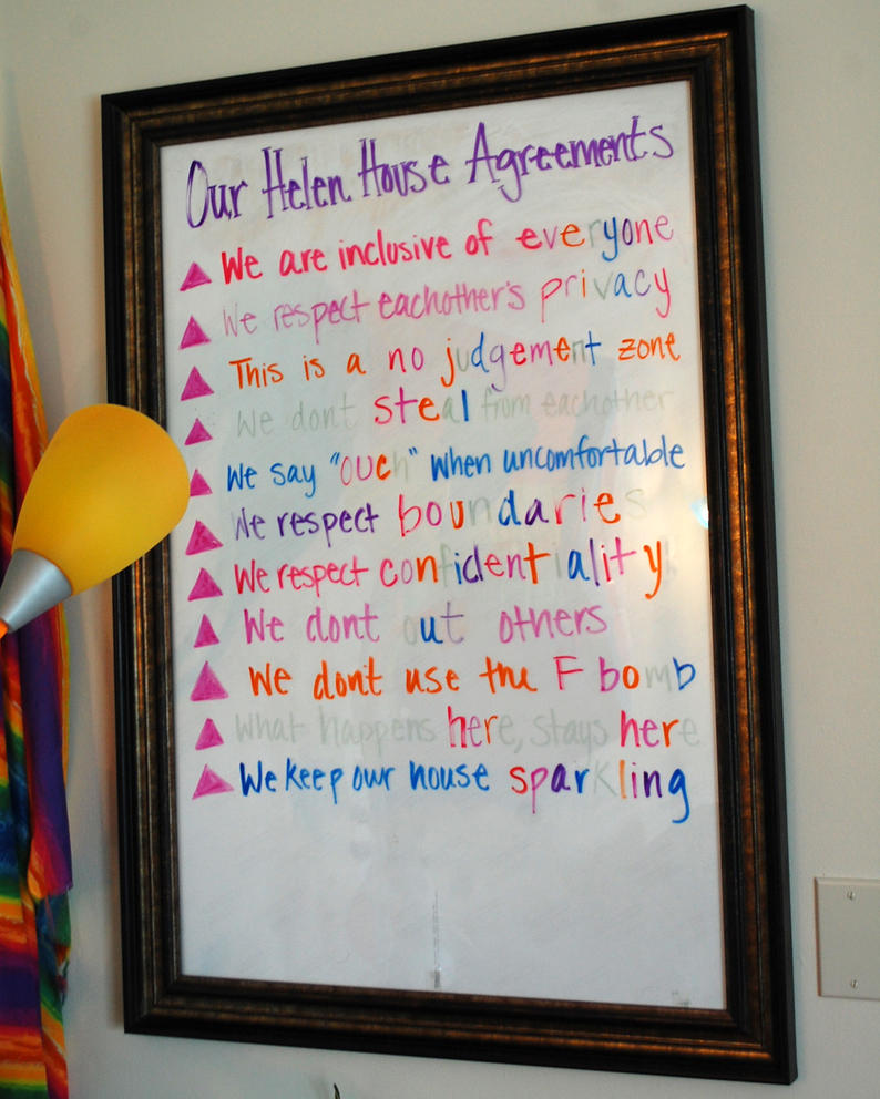 House rules are seen on a white board at Helen House