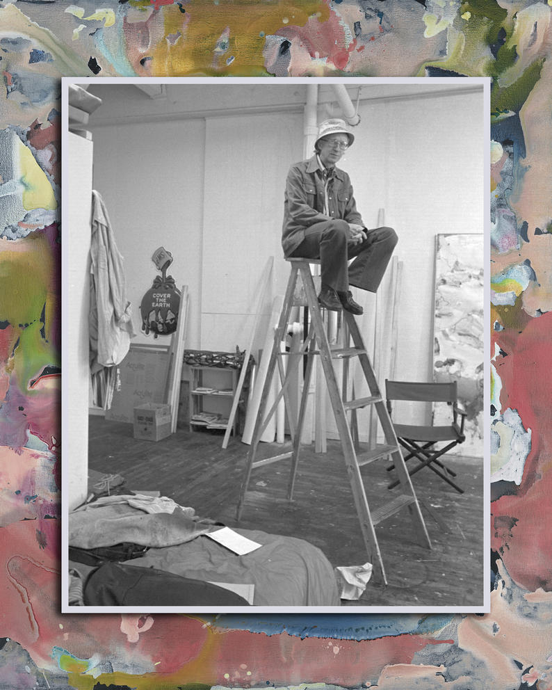 Black and white photo of someone on a ladder in a gallery 