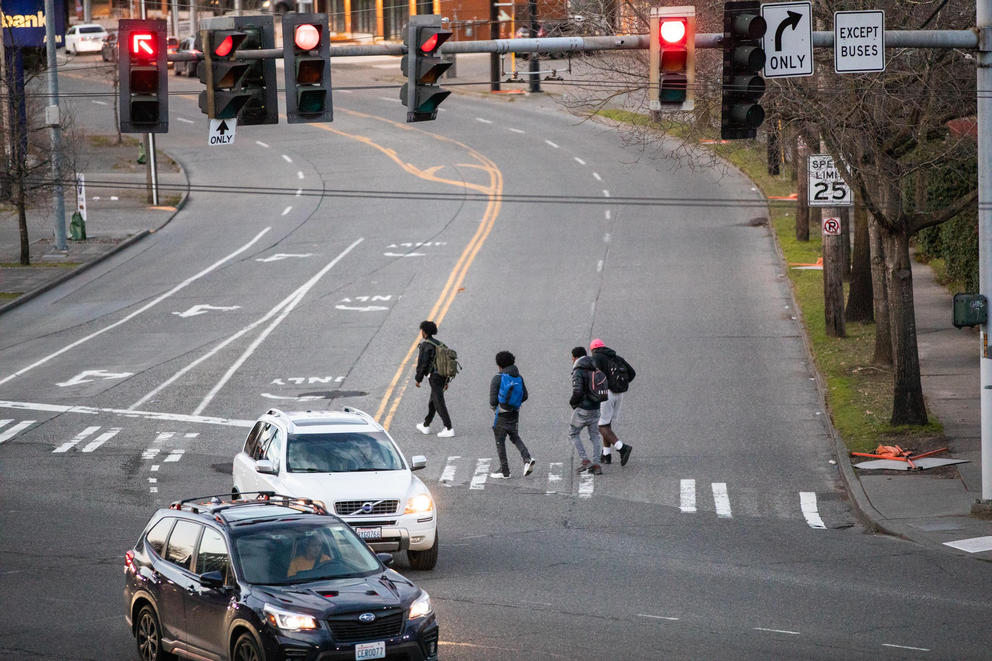 Students cross the intersection of Rainier Avenue South and Martin Luther King Way