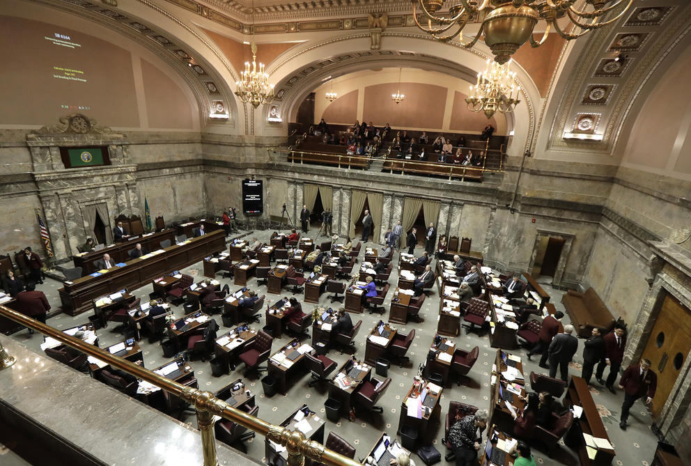 A picture of lawmakers at work on the floor of the Washington Senate.