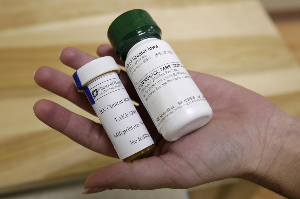 Bottles of abortion pills mifepristone, left, and misoprostol, right