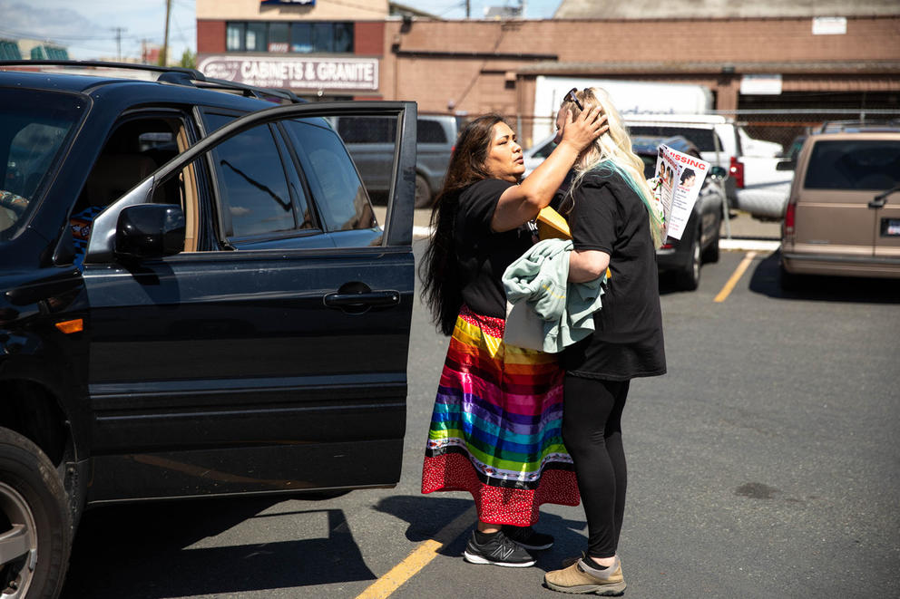 Roxanne White, left, comforts Rhonda Taylor, the mother of Shaulina Bulltail.