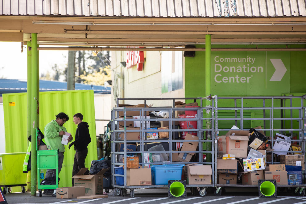 Workers organize donated items to Value Village in Burien.