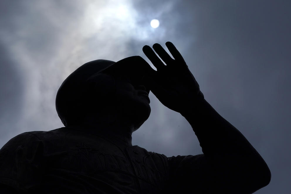 Sun above the statue of Seattle Mariners Hall-of-Famer Ken Griffey Jr. at T-Mobile Park in Seattle. 