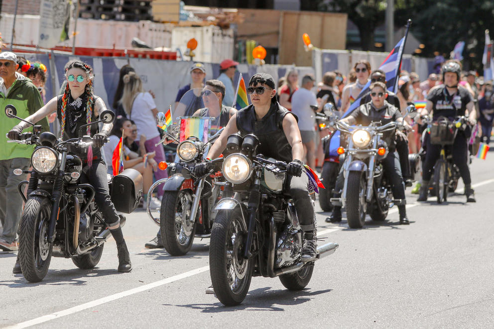 Dykes on Bikes ride down Fourth Ave in Seattle 