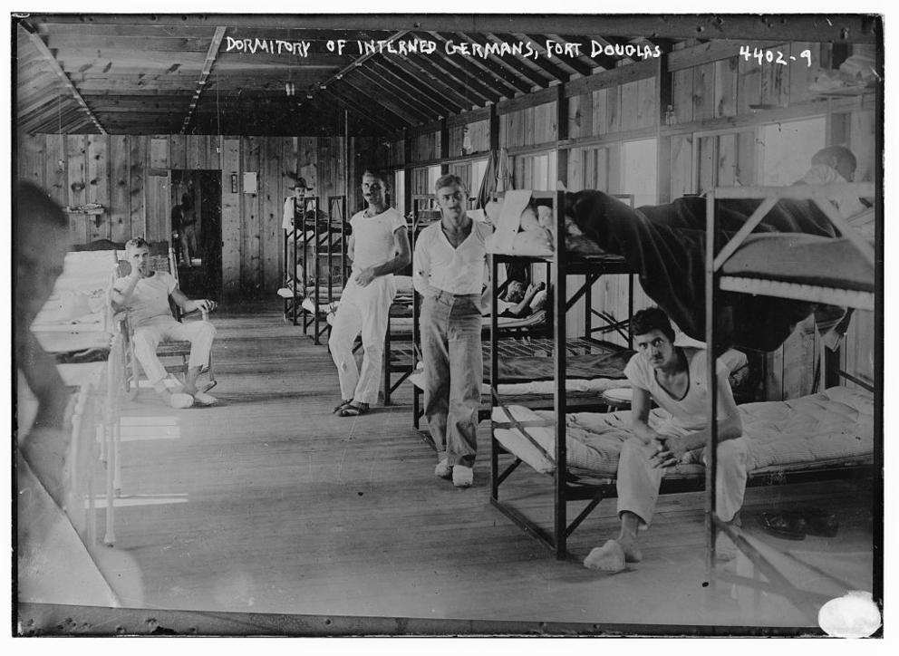 Archival image of men in a bunkhouse