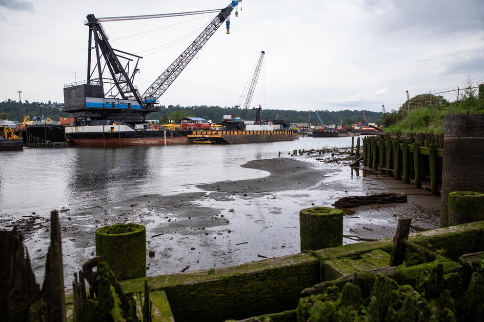an industrial crane over the duwamish river 