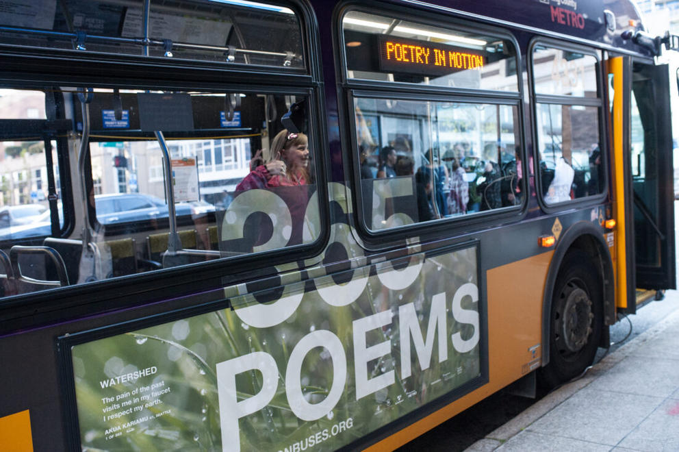 photo of a metro bus with the words 365 poems on the side