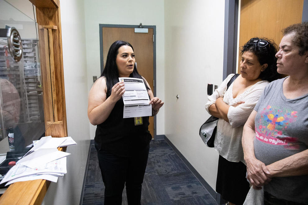 Martha Jimenez shows ballot to citizenship class