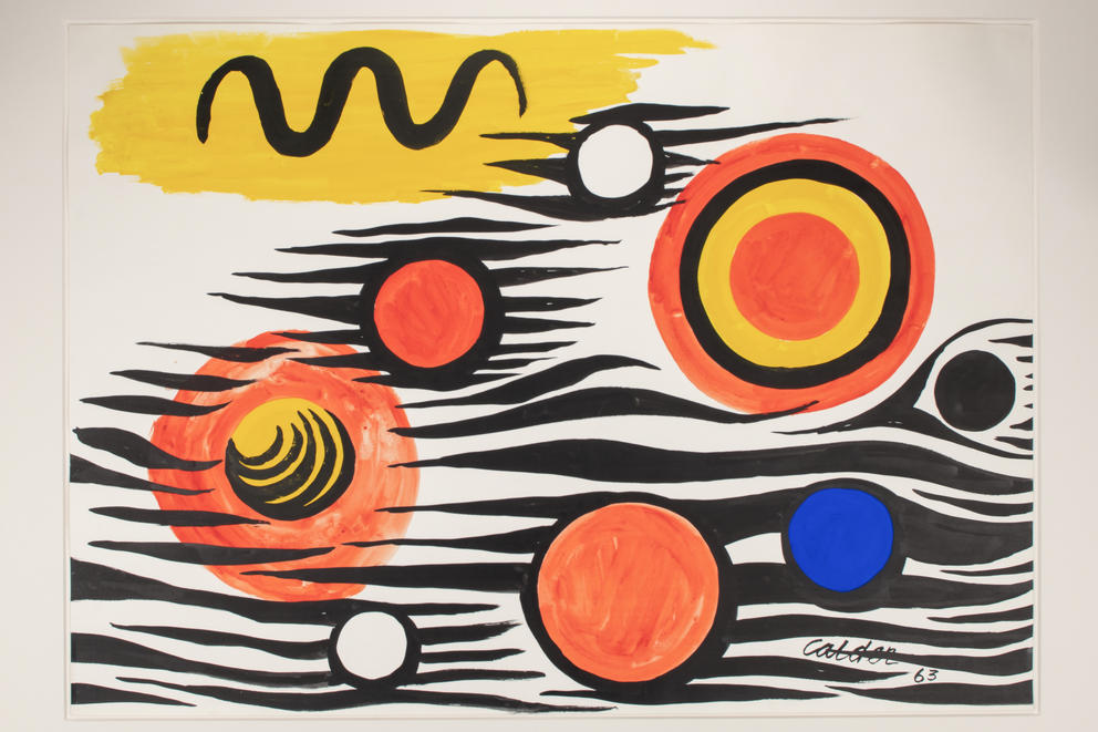 yellow black and orange abstract painting of planetary orbs and waves