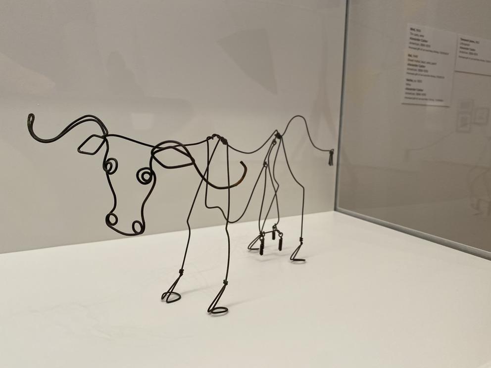 photo of a wire sculpture of a cow