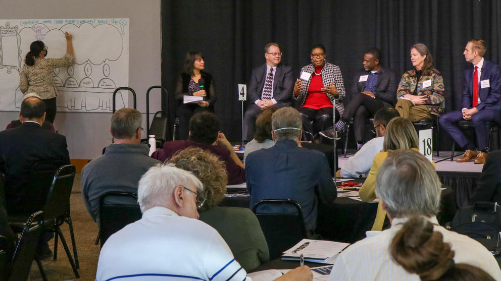 A picture of panelists at the Civic Health Summit in October discuss bridging political divides.