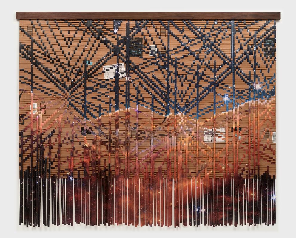 a tapestry woven from cardboard boxes and a space phot