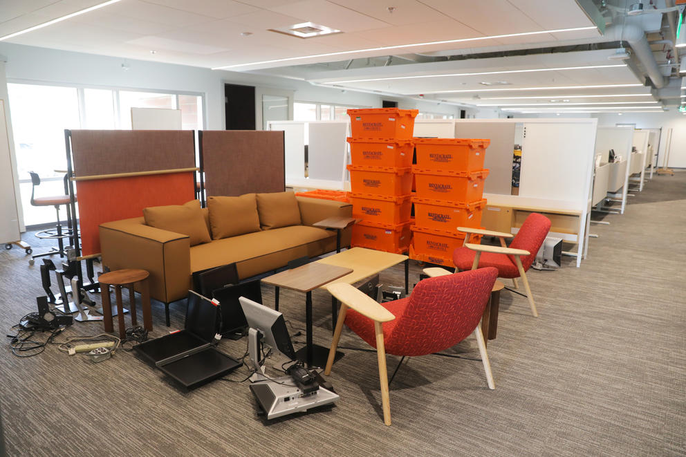 crates, furniture and equipment at the new building.