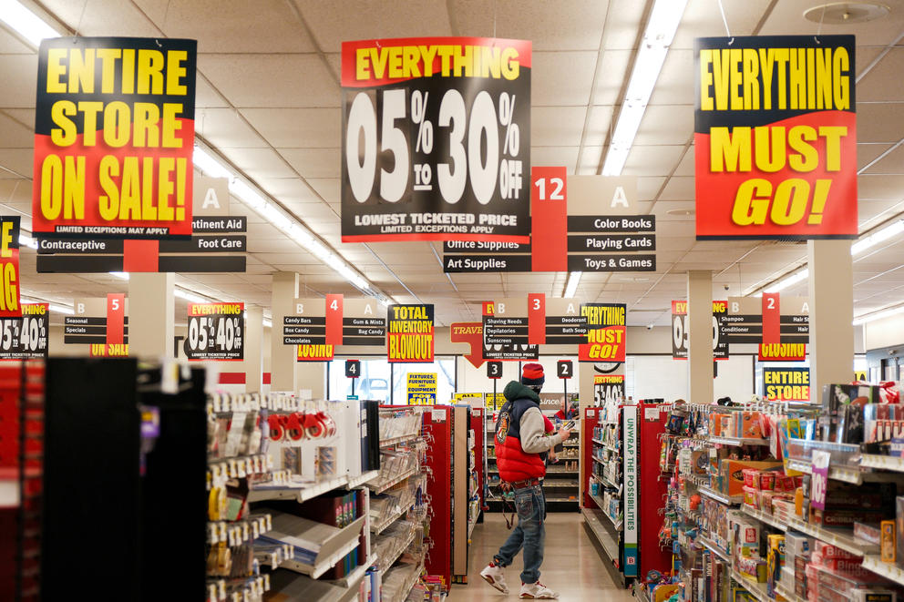Liquidation signs hang from the ceiling in the Wallingford neighborhood location