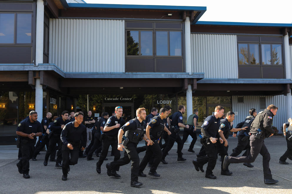 New police recruits begin a training exercise at Washington's Criminal Justice Training Center. 