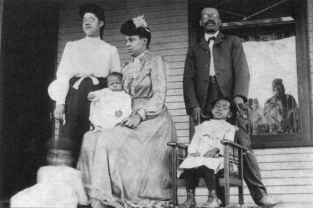 The Cayton-Revels family on their front porch