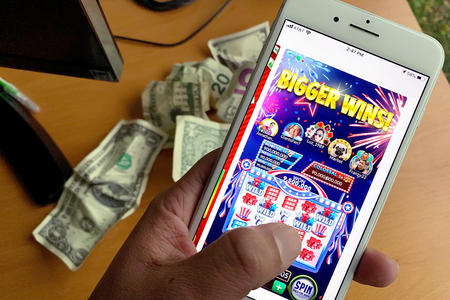 Phone with Big Fish Casino app