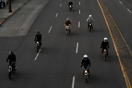 Motorcyclists riding six feet apart on the Ballard Bridge