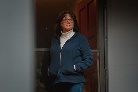 Woman standing in a doorway