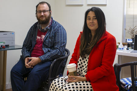 Two people sitting in a campaign office 
