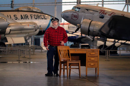 Knute Berger at a desk inside the Museum of Flight