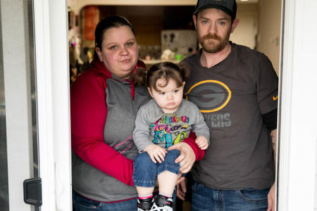 Kari Forbes, 33, and Brian Graap, 35, with their 2-year-old daughter Kadence at their Bellevue apartment, Jan. 11, 2018.	Credit: Matt M. Mcknight/Crosscut