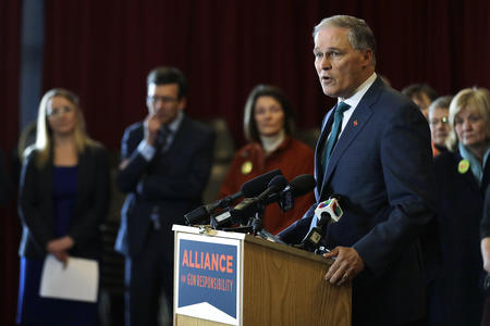 A picture of Gov. Jay Inslee speaking at an event.