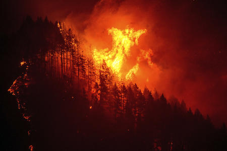 A wildfire burns the Columbia River Gorge in Oregon