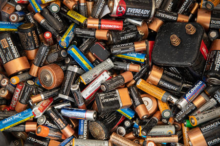 a pile of different types of household batteries 