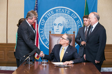 Gov. Jay Inslee signs SSB 5296, April 17, 2015. Relating to locksmith services.