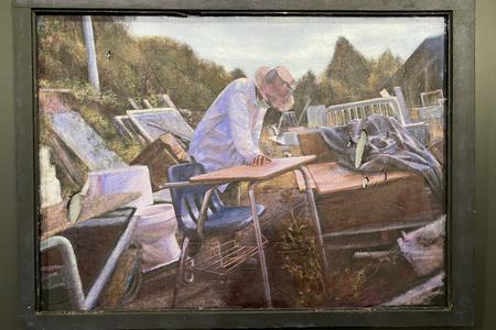 painting of a man in a salvage yard