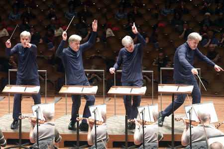 four shots of a conductor conducting