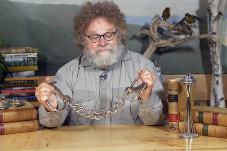 Knute holding leg irons